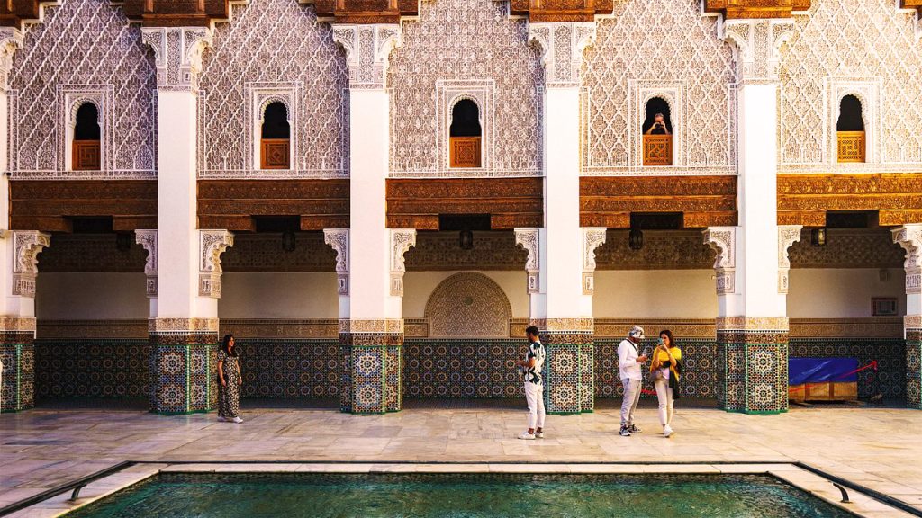 Vibrant street scene in Marrakech with traditional Moroccan architecture