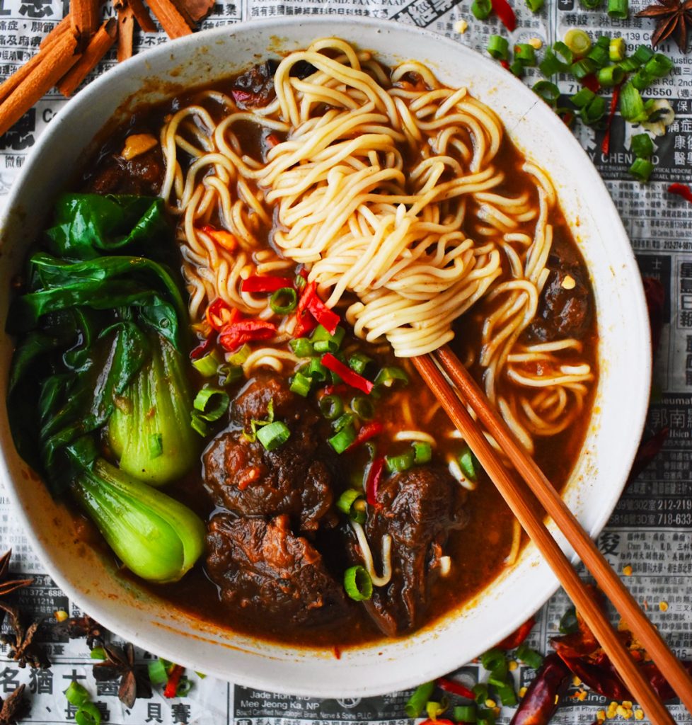 Taiwanese beef noodle soup, a comforting and flavorful staple of Taipei cuisine