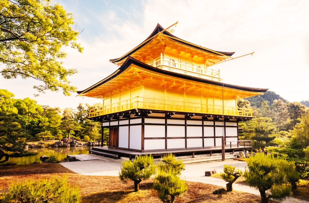 “Kinkaku-ji, Kyoto’s Golden Pavilion, shimmering above its reflective pond.”