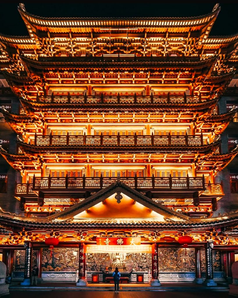 Traditional temple in Guangzhou with ornate red columns and detailed architecture