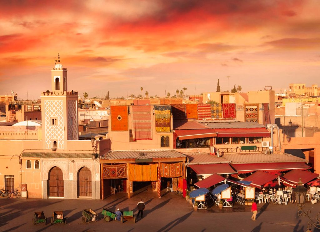 Sunset over Marrakech painting the sky in warm desert tones
