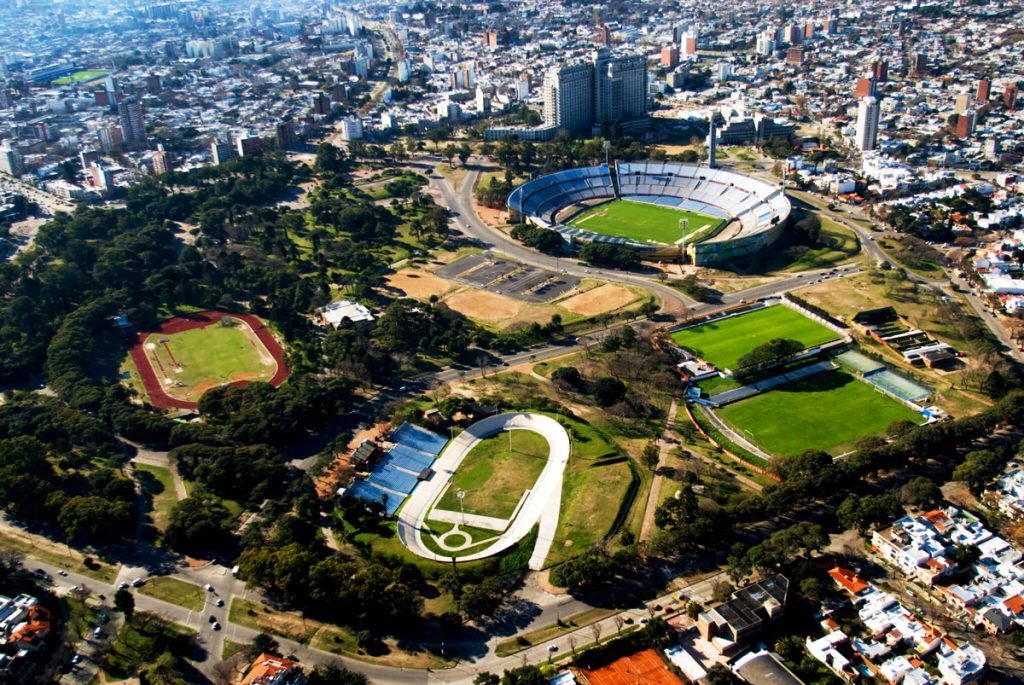A vast green space with monuments, including the striking Estadio Centenario, birthplace of the first FIFA World Cup.