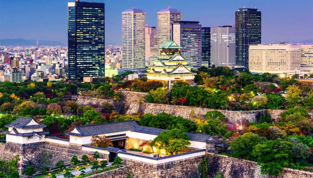 “Osaka skyline with a mix of modern skyscrapers and bustling city life.”
