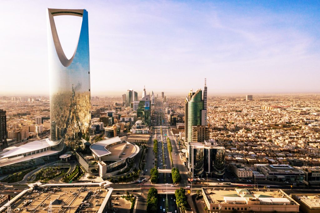 Riyadh skyline with the iconic Kingdom Centre Tower rising above modern skyscrapers in Saudi Arabia