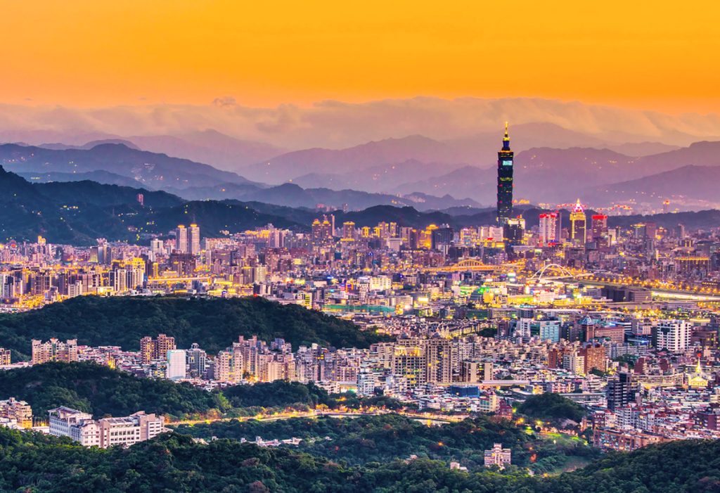 “Taipei skyline with Taipei 101 rising above the city.”