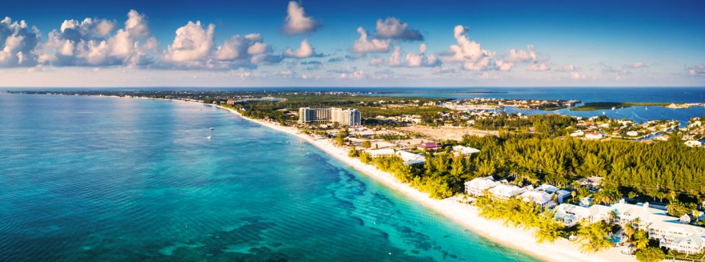Crystal-clear waters and white sands of Grand Cayman in the Caribbean